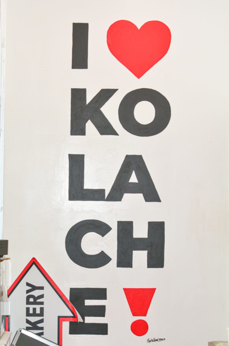 The I love Kolache mural inside of the Colorado Kolache bakery that serves Kolaches which is a traditional Czech pastry March 25. This is a family-owned business that opened in January 2022 offering over 70 varieties. 