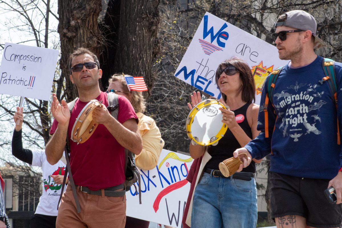 Protesters accompany chants with tambourines, drums and cowbells while marching up North Howes street towards Civic Center Park March 28. As part of the third No Kings rally, these attendees marched through Fort Collins protesting the actions of the Trump Administration. “Money for public education, not for ICE or deportation, all are welcome in our nation!” protesters shouted.