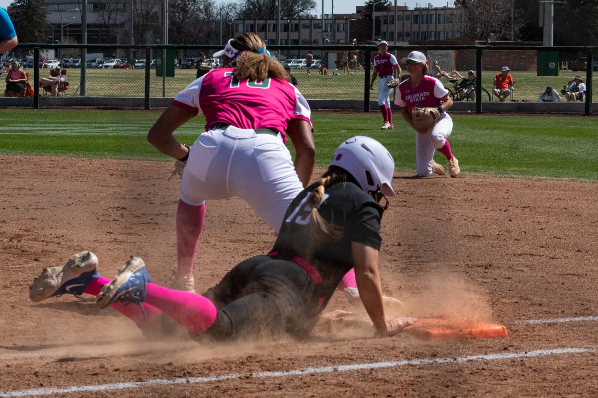 Junior Jailey Wilson catches a throw to first base to catch a Boise State player out during Colorado State University’s Pink Out game against Boise State at the CSU Softball Field Mar. 29. The Rams won 7-6.