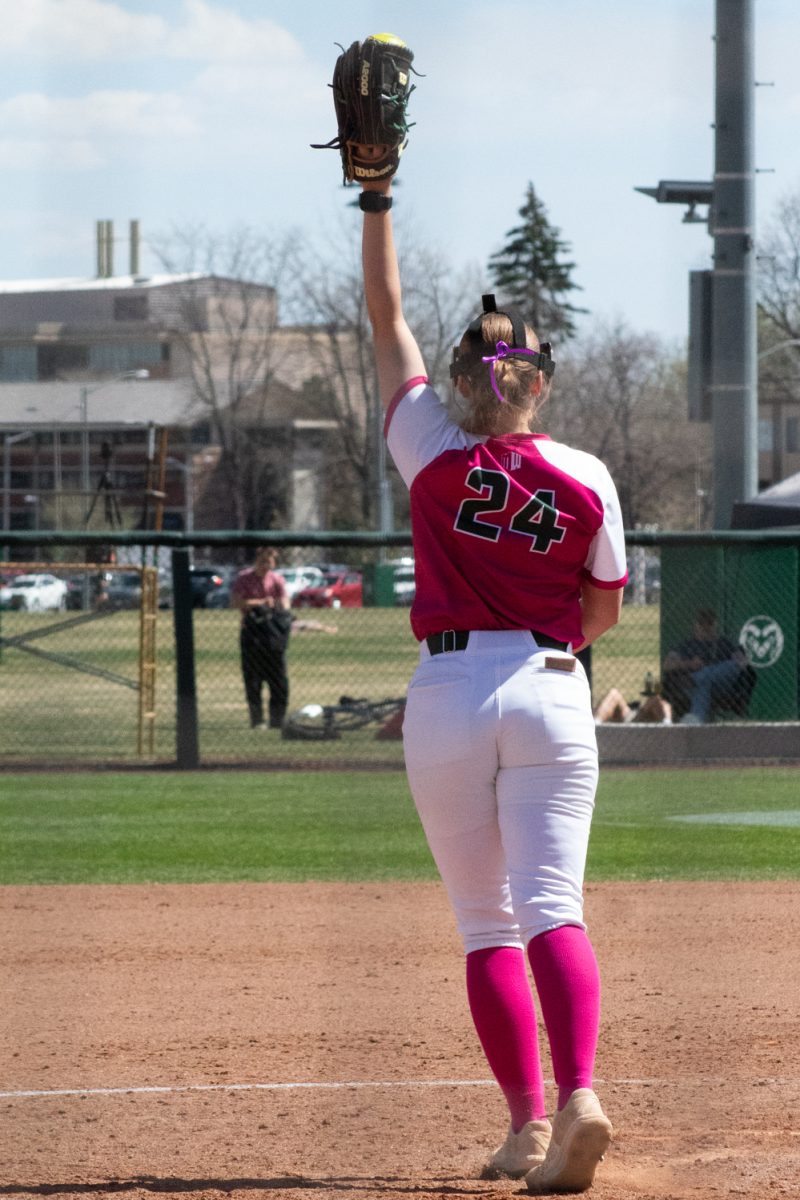 Freshman Olivia Schmidt holds up a ball she caught off the bat of a Boise State player during Colorado State University’s Pink Out game against Boise State at the CSU Softball Field Mar. 29. The Rams won 7-6 in a walk-off win.