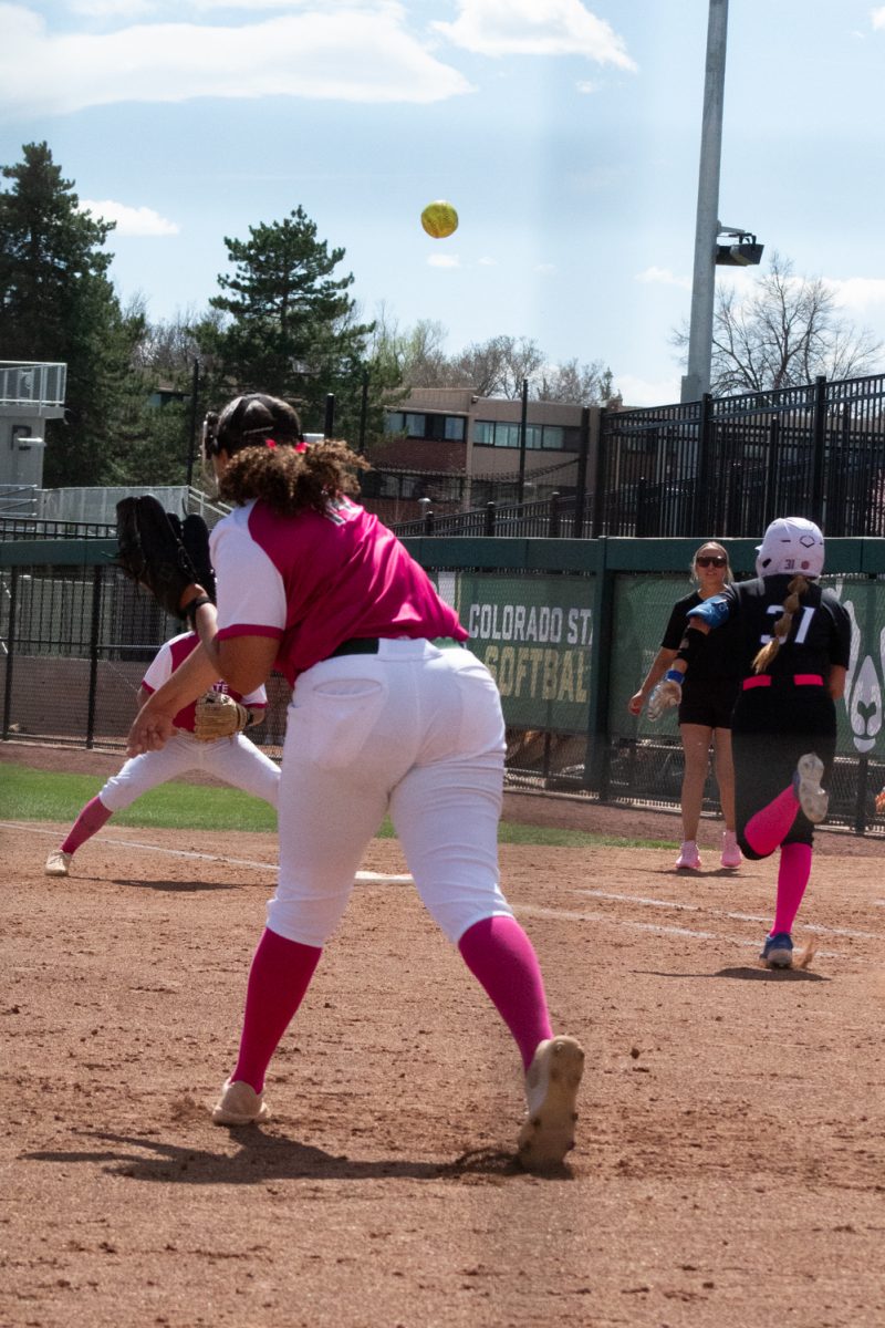 Senior Giselle Bentley throws a ball to first base to catch a runner out during Colorado State University’s Pink Out and Colors for a Cause game against Boise State at the CSU Softball Field Mar. 29. The Rams won 7-6 in a walk-off win.