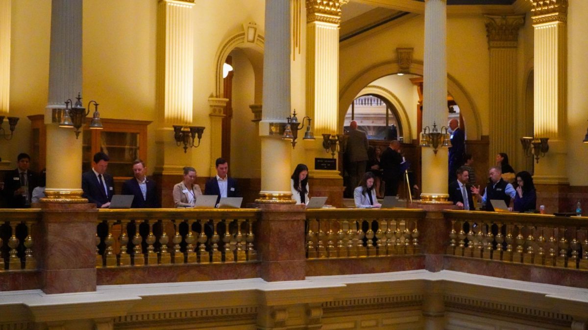 Staffers of the Colorado General Assembly work March 31 during the legislative session. 