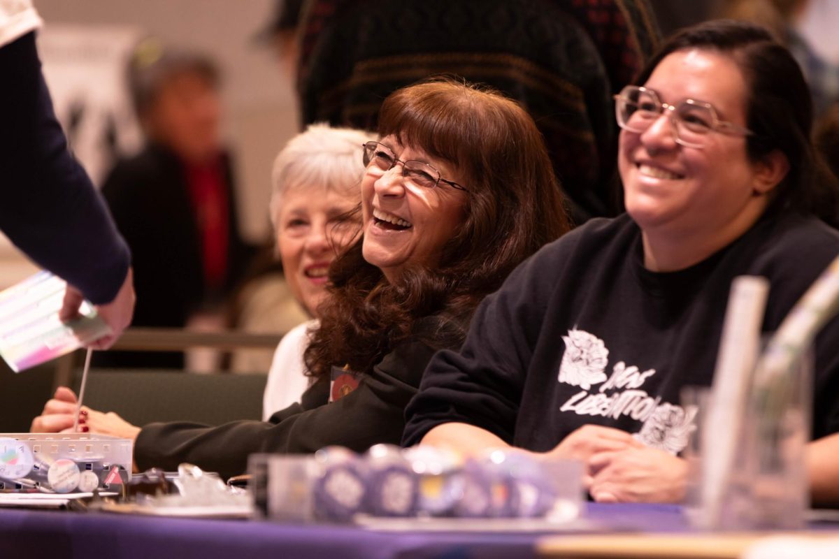 Organization tabelers laugh during Colorado State University's Civic Engagement Fair event in the Lory Student Center, March 9. "it's fun to see people engaging in a civic way." Said Sarah Melbwhite.