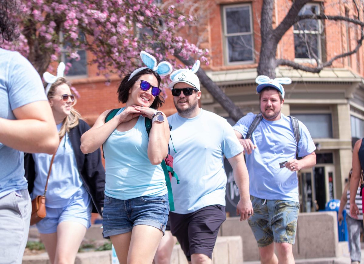 Easter Keg Scavenger Hunt participants search for the hidden laughs during the event in Old Town Fort Collins, March 28.