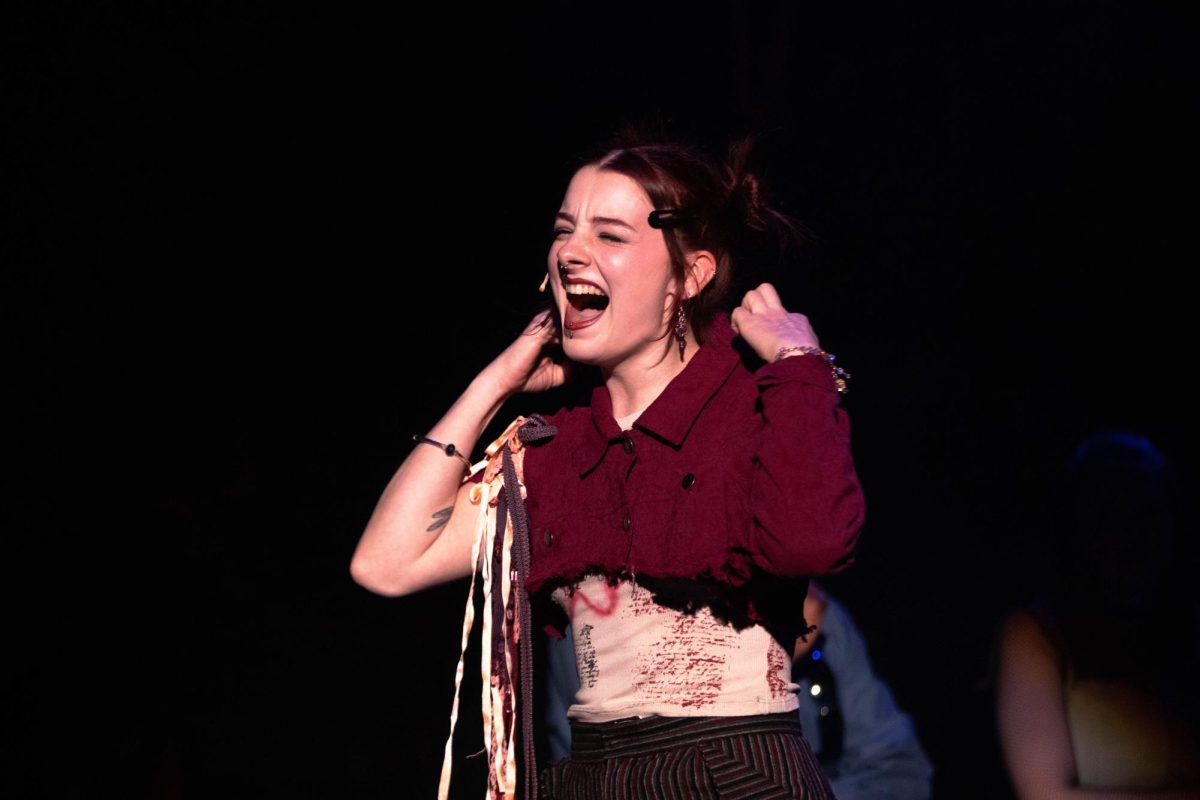 Character "Maureen" in Rent musical portrayed by a Colorado State University theater major and actor gives an intense monolouge during Rent musical dress rehearsal in the University Center of the Arts, March 5.