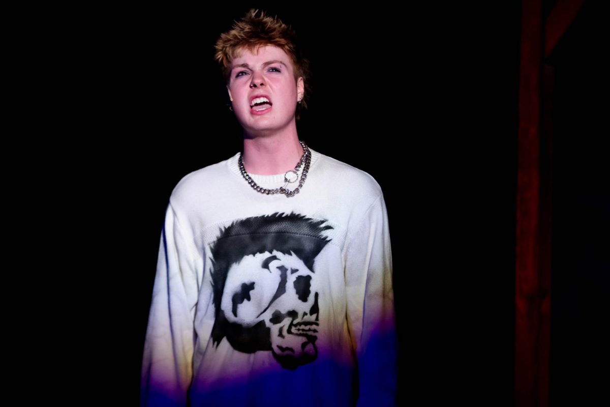 Rent musical character "Roger" sings during dress rehearsal, played by a Colorado State University theater major and actor at the University Center of the Arts, March 5.