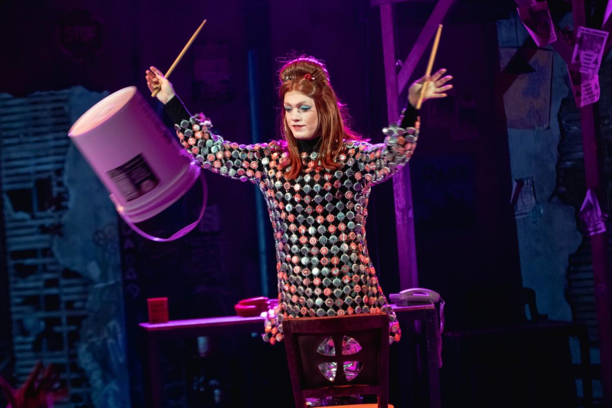 Colorado State University theater major and actor plays "Angel" character in Rent musical dress rehearsal in the University Center of the Arts, March 5.