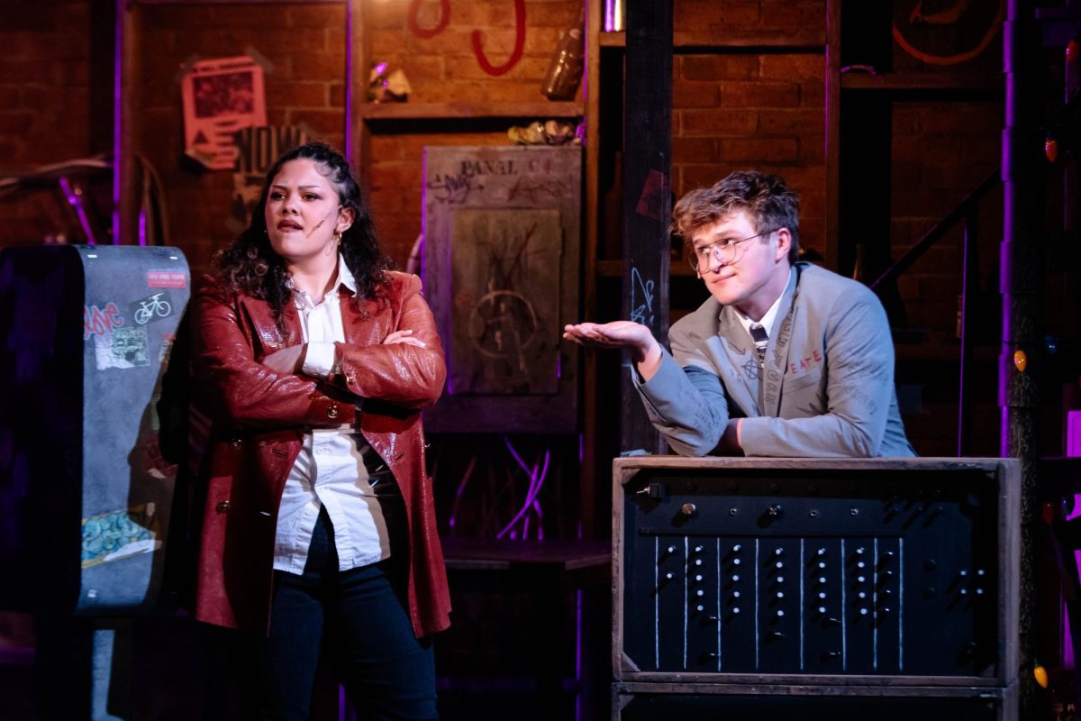 Colorado State University theater majors and actors portray "Mark" and "Joanne" in Rent musical dress rehearsal in the University Center of the Arts, March 5.