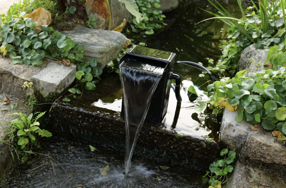 Why a Solar Waterfall Pump Is the Easiest Way to Build a Backyard Water Feature