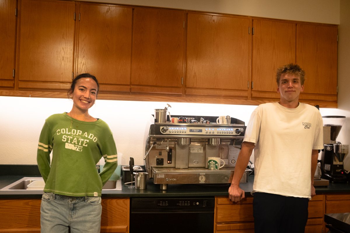 Rylee Mchugh and Jacob Moats pose for a picture next to their new espresso machine April 1. Rylee and Jacob are student employees and the future managers for the Gifford Cafe this upcoming fall 2026