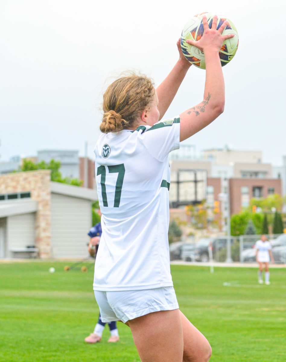 Bridget Arnold throwing the ball to her teammates to resume the game against University of Northern Colorado April 25. Colorado State University defeated UNC 4-0. 