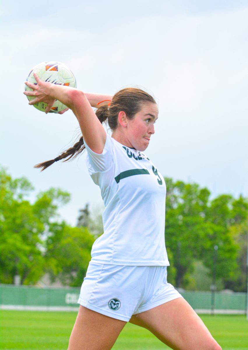 Colorado State University women's soccer player throwing the ball into play against University of Northern Colorado April 25. Colorado State displayed a tough defense resulting in the finishing score of 4-0. 