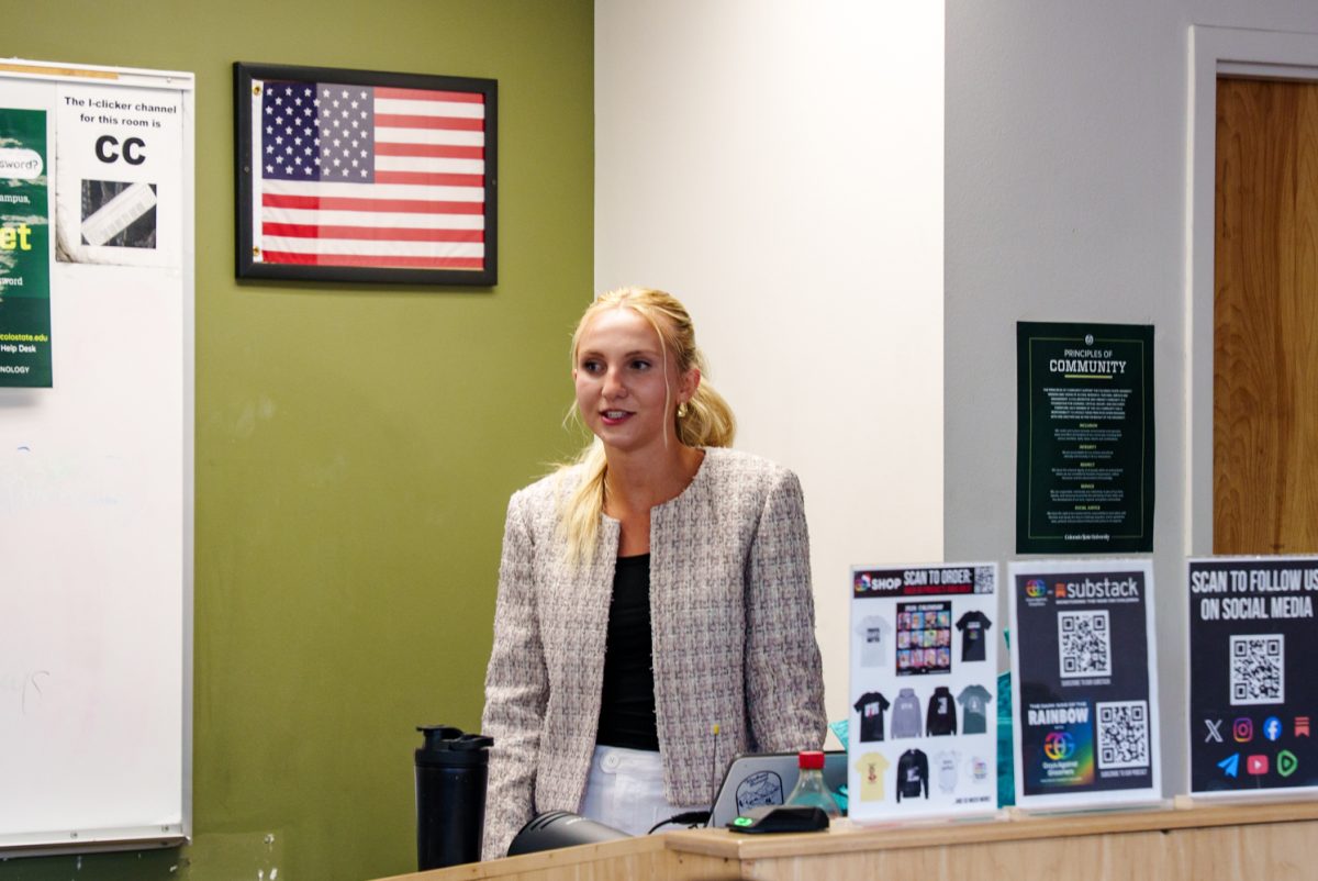 Vice president of Colorado State University's branch of Turning Point USA Cammy Barnes introduces guest speakers from Gays Against Groomers during a meeting April 16.