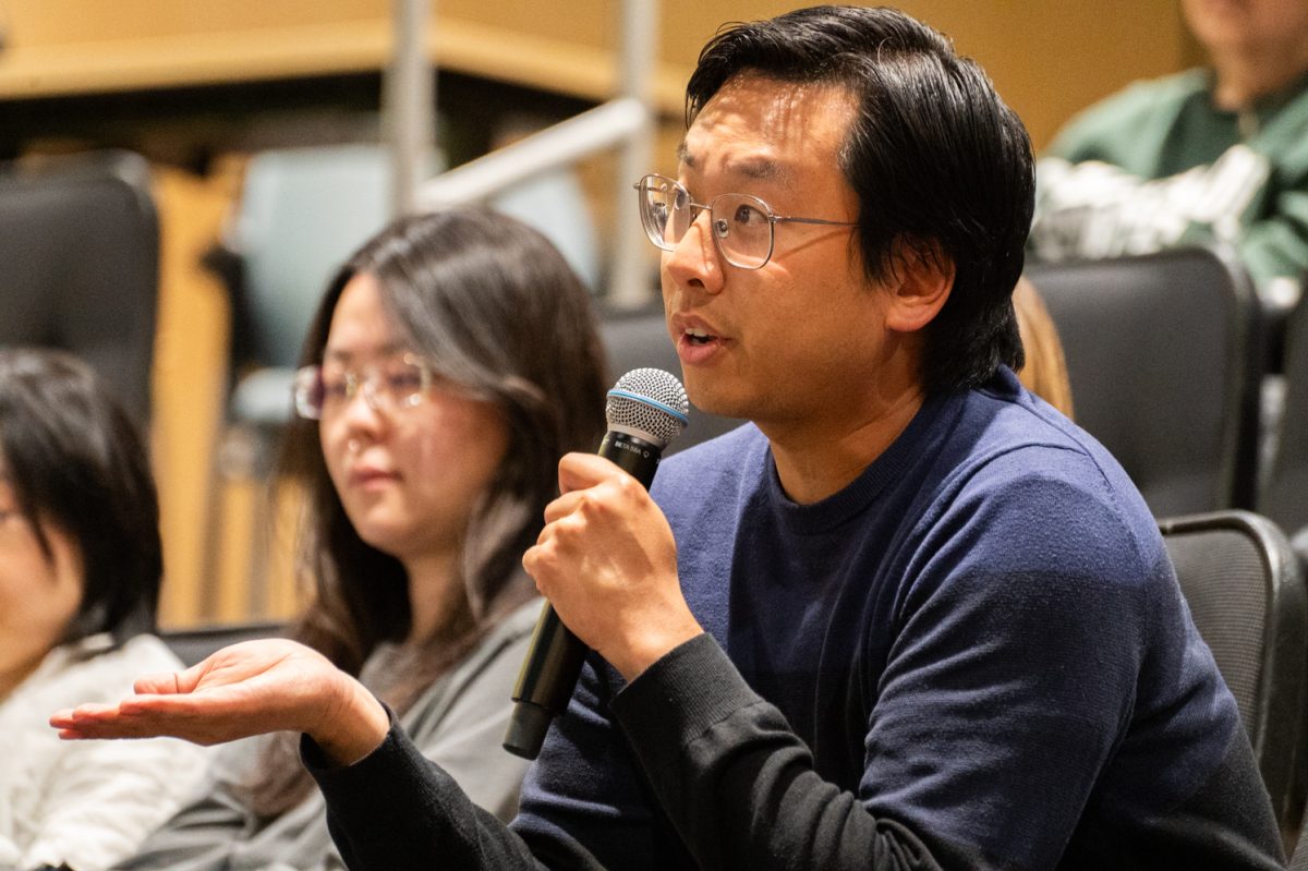 Andrew Du, an assistant professor in geology and anthropology at Colorado State University, asks John Chuck, the co-director of "Chinatown Rising," a question regarding John Chuck’s early experience with activism alongside his father April 17.