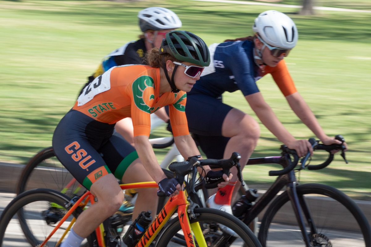 Anna Petr, a Colorado State University Club Cycling team member, passes her competitors during the Oval Criterium April 18.
