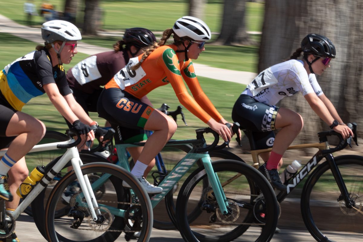 Eleanor ‘Nora’ Dausch, a Colorado State University Club Cycling team member, races cyclists from other universities during the Oval Criterium April 18. The race was a 40 minute sprint.