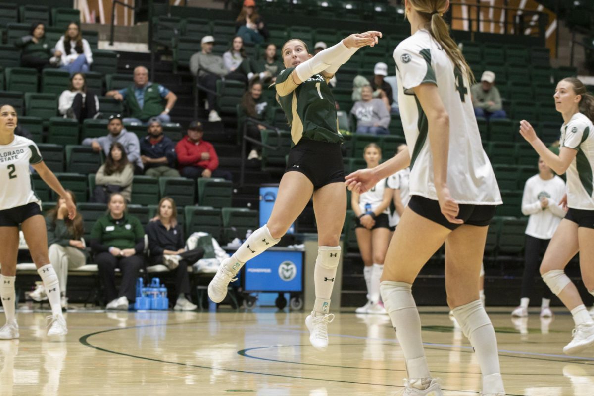 Karsyn Fetzer (1) bumps ball in scrimmage game. Colorado State University played Denver University and Colorado University in Moby Arena, April 4th.