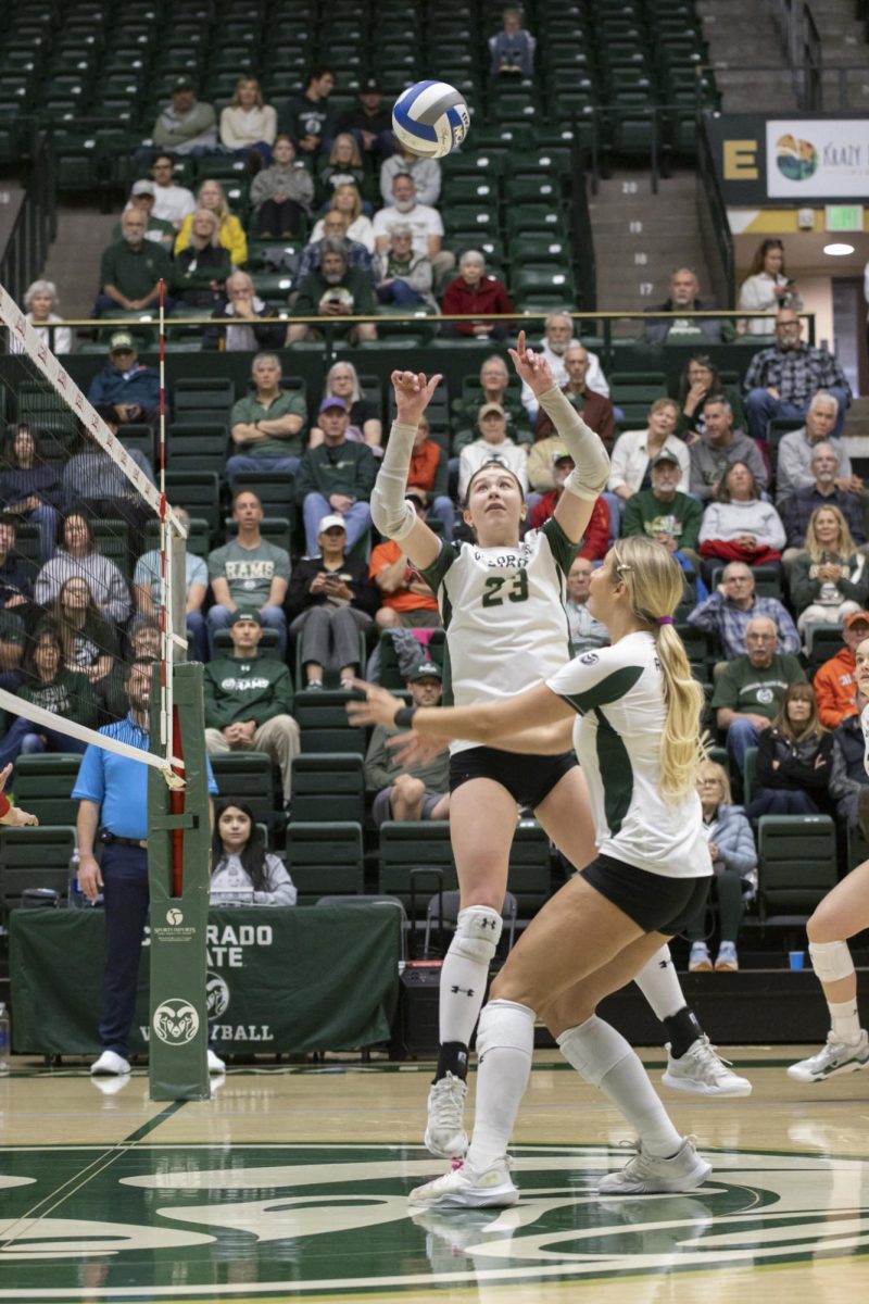 Erin Debiec (23) sets a ball in scrimmage game. Colorado State University played Denver University and Colorado University in Moby Arena, April 4th.