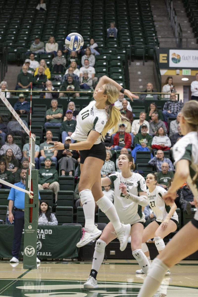 Brenna Rowland (10) hits a ball in scrimmage game. Colorado State University played Denver University and Colorado University in Moby Arena, April 4th.