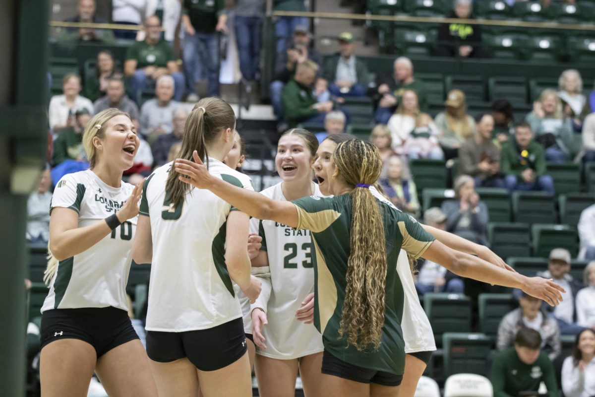 The Rams celebrates a point during a scrimmage game. Colorado State University played Denver University and Colorado University in Moby Arena, April 4th.