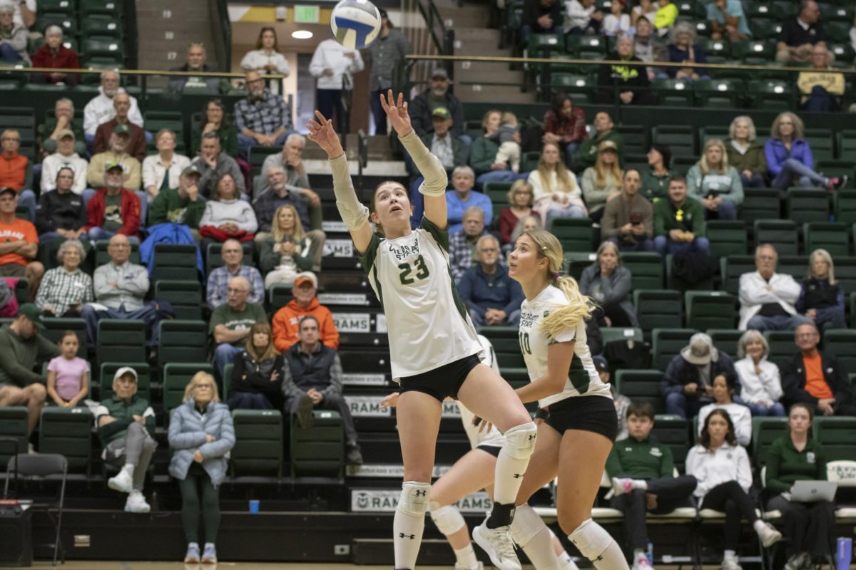 Erin Debiec (23) sets a ball in scrimmage game. Colorado State University played Denver University and Colorado University in Moby Arena, April 4th.