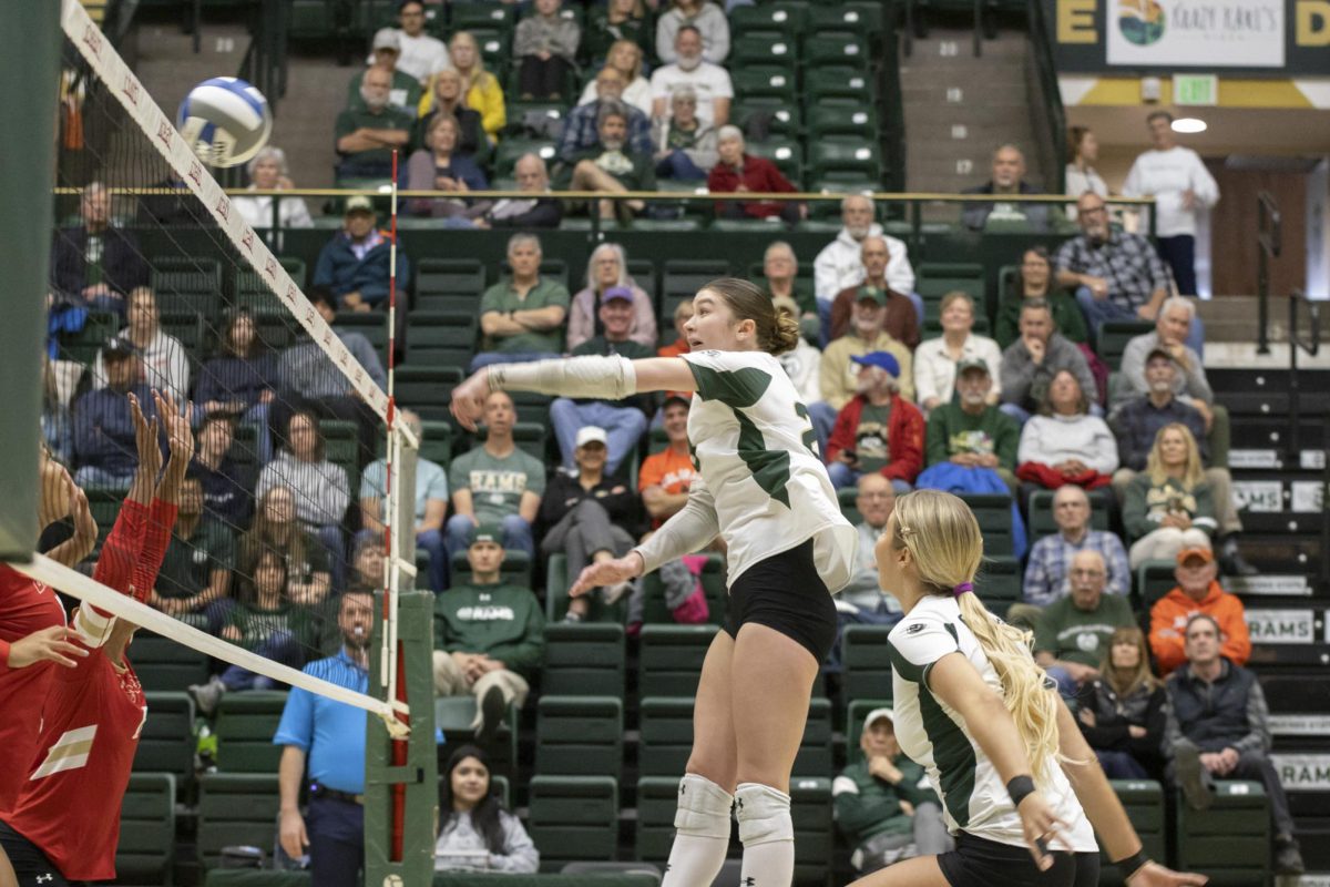 Erin Debiec (23) hits a ball in scrimmage game. Colorado State University played Denver University and Colorado University in Moby Arena, April 4th.