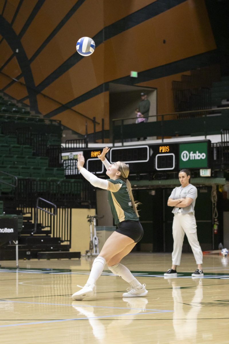 Karsyn Fetzer (1) serves ball in scrimmage game. Colorado State University played Denver University and Colorado University in Moby Arena, April 4th.
