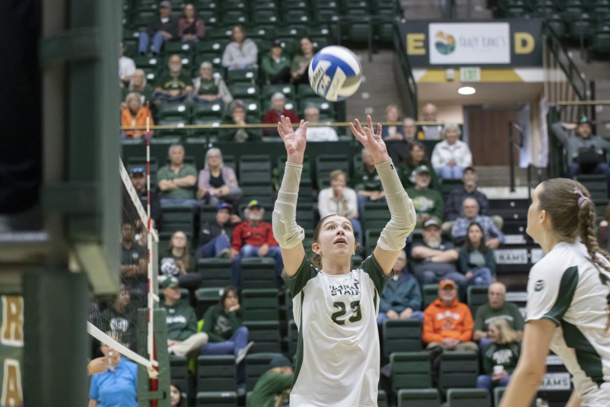Erin Debiec (23) sets a ball in scrimmage game. Colorado State University played Denver University and Colorado University in Moby Arena, April 4th.