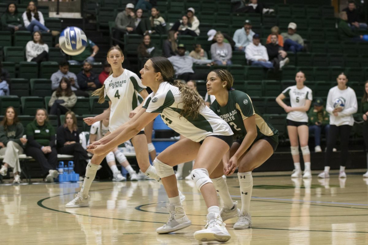 Maria Brun (26) bumps a ball in scrimmage game. Colorado State University played Denver University and Colorado University in Moby Arena, April 4th.