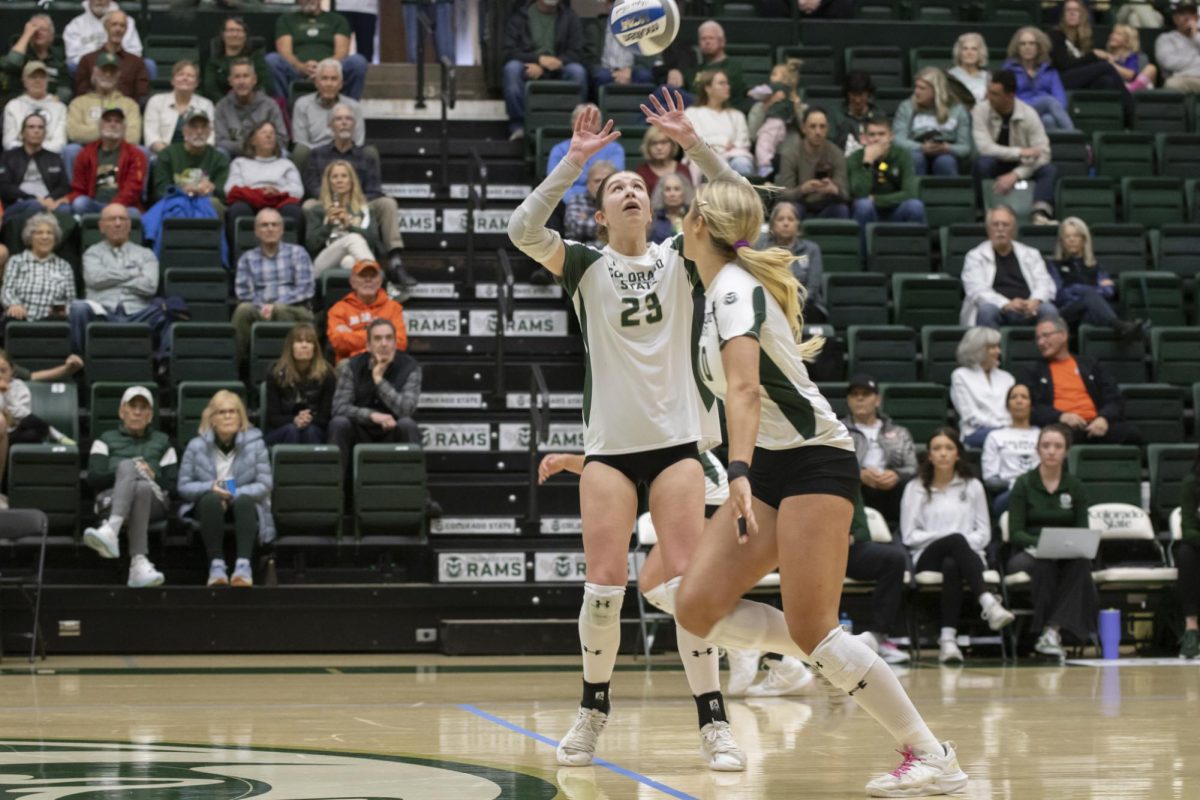 Erin Debiec (23) attemps to block a ball in scrimmage game. Colorado State University played Denver University and Colorado University in Moby Arena, April 4th.