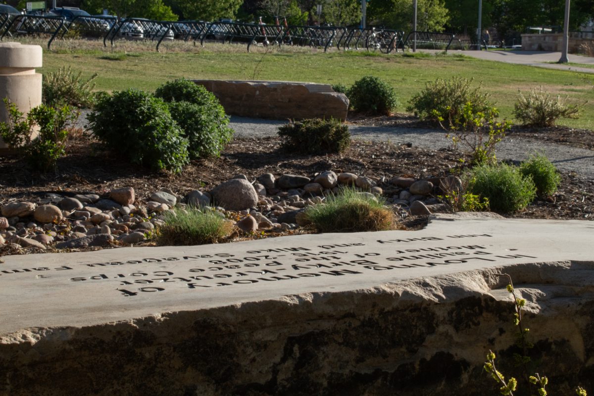 A memorial bench at the Colorado State University Peace Corps tribute garden, near the south entrance of the Lory Student Center April 22. The garden was designed to recognize the role CSU played in the formation of the Peace Corps.