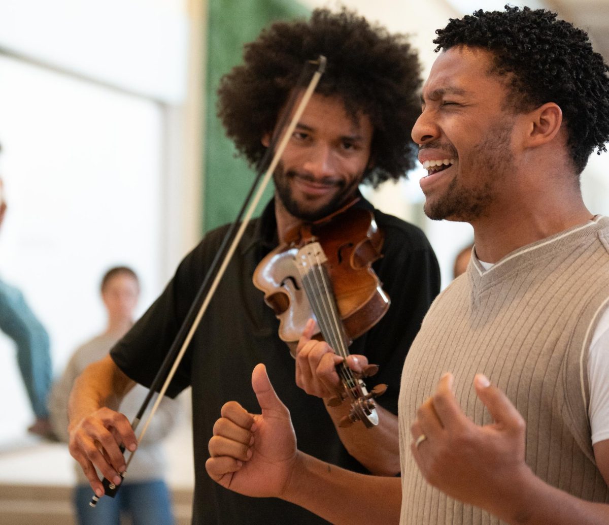 Philip Cutler, a violinist and son of the event’s curator, and Ezedrick Wilson III, a singer at the exhibition performed a cover of Sam Cooke’s “A Change is Gonna Come,” April 24. Knowing each other’s talents would complement the other, the two wanted to help support Louise Cutler by performing together. “I think in today’s age, especially after the pandemic, we really kinda lose sight in what community is, what fellowship is, and how important community is, because we live very individual lives,” Wilson said. “We forget that we all need each other in some way, shape, or form or capacity, we all depend on each other.”