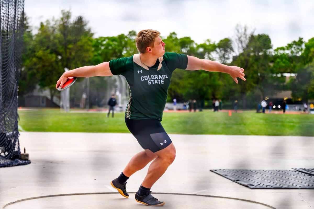 Colorado State University track and field athlete Kyle Bigley starts his discus throw during CSU's Border Dual Meet against the University of Wyoming April 25. Bigley placed third with a mark of 50.93 meters.