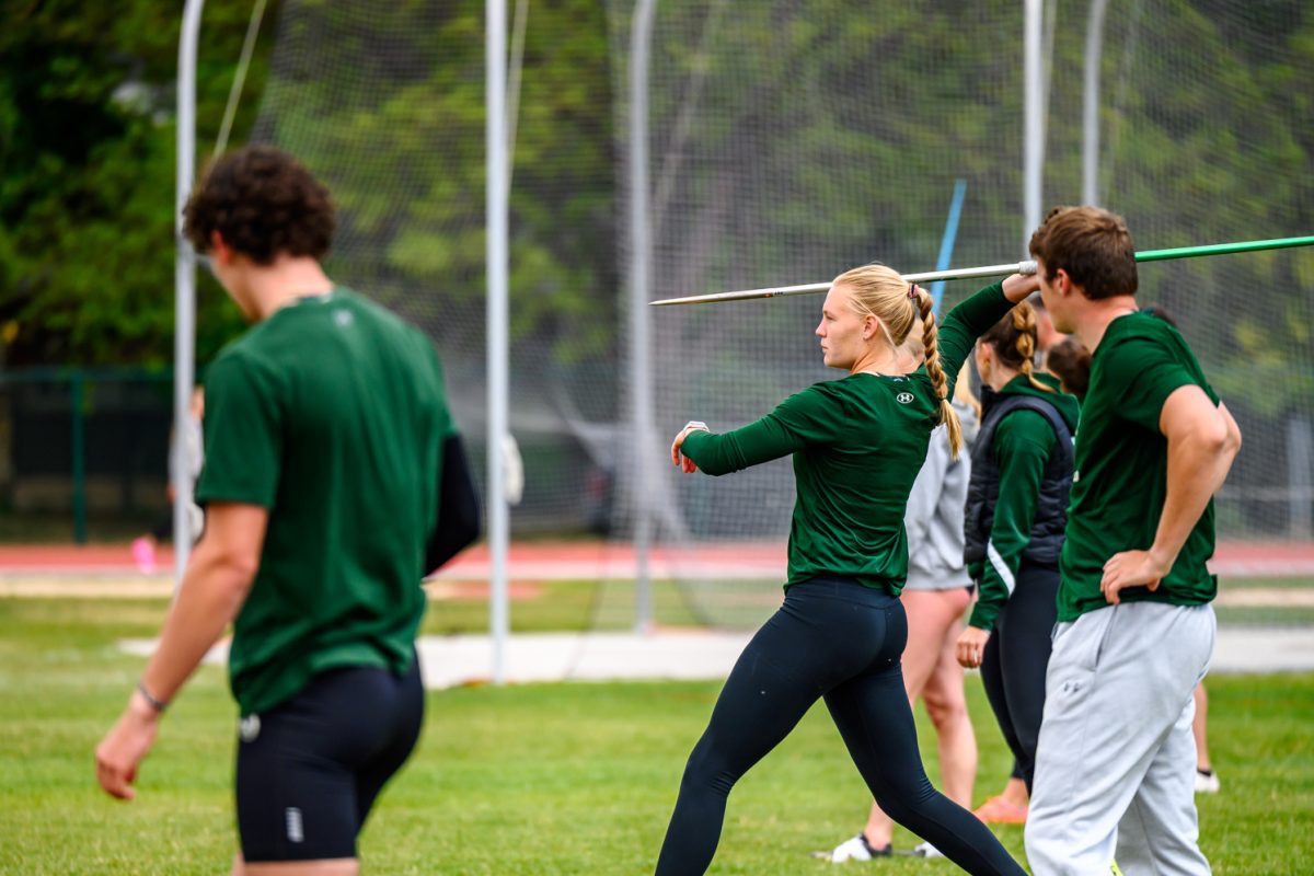 Colorado State University track and field athlete Jet Van Der Heijden warms up with other CSU javelin throwers during the Border Dual Meet April 25. Van Der Heijden placed first with a personal record mark of 49.60 meters.