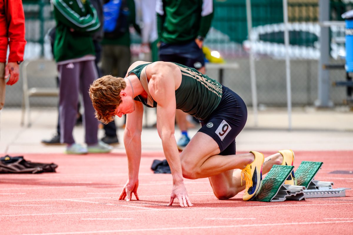 Colorado State University track and field athlete Kenny Carpenter lines up for the men's 200 meter dash during CSU's Border Dual Meet April 25. Carpenter finished first with a time of 21.24 seconds.