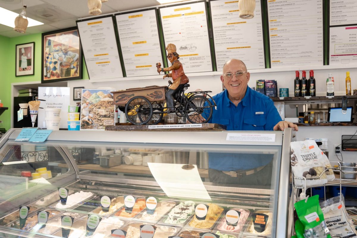 Paul Pellegrino, the owner of Gelato & aMore, stands behind the counter April 19.