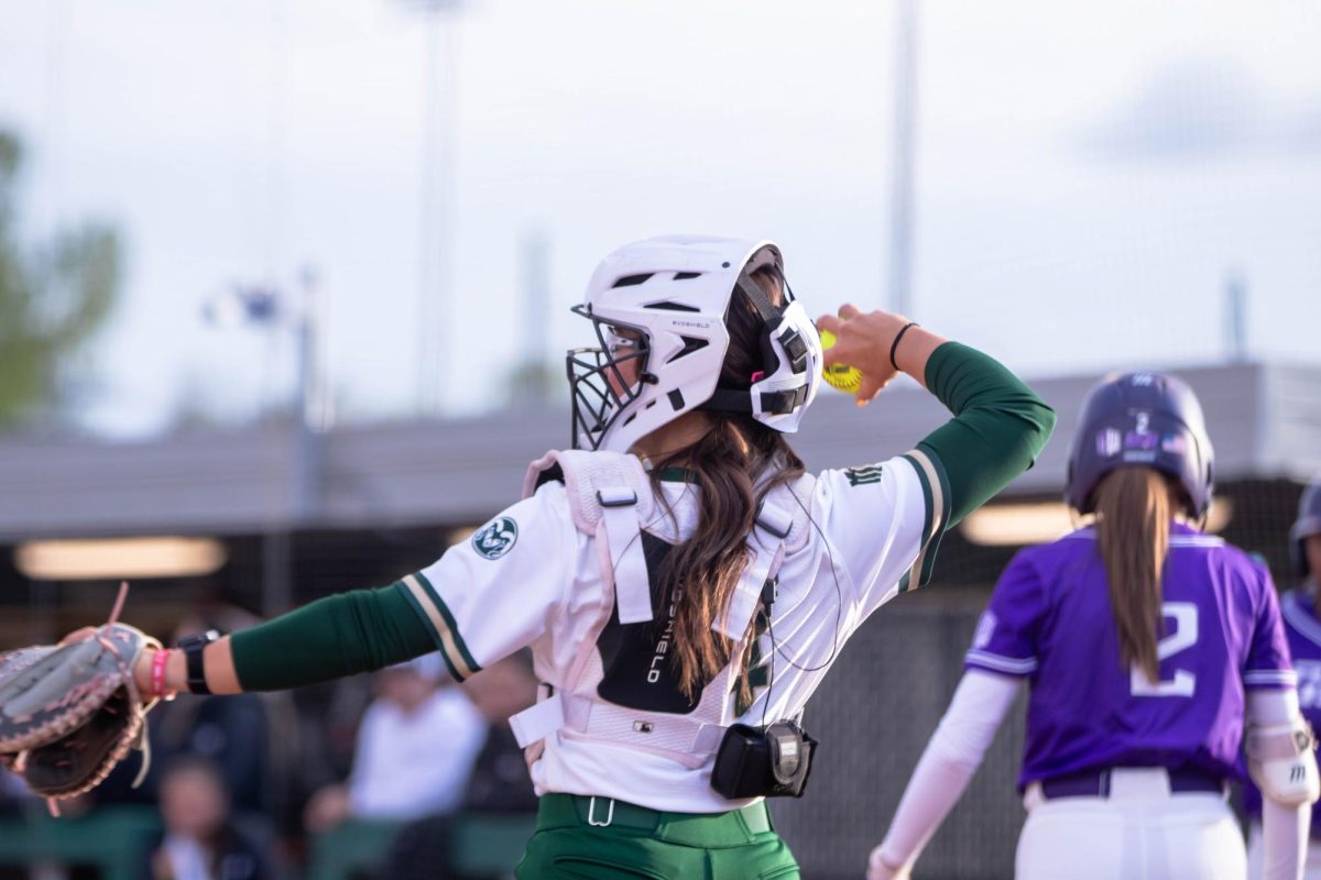 Colorado State University catcher throws ball back during game against Grand Canyon University, April 30.