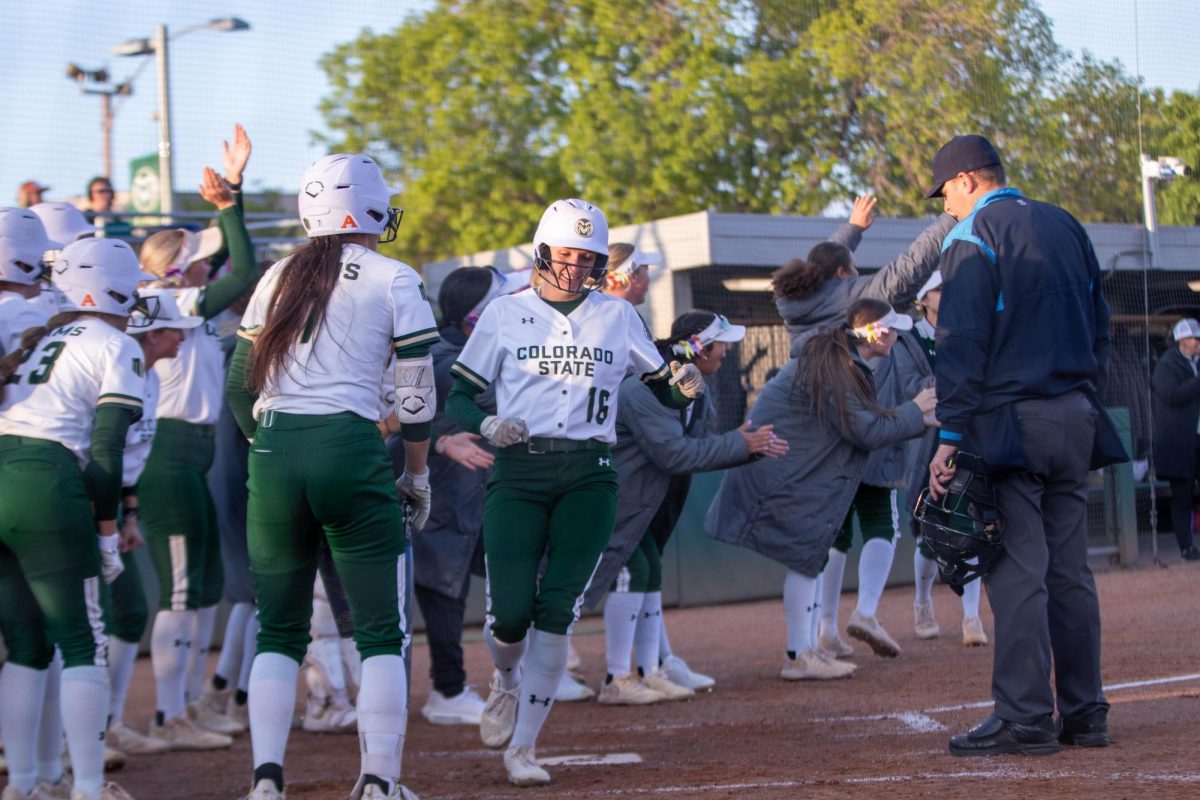 Colorado State University Softball team celebrates a homerun during game against Grand Canyon University on April 30.