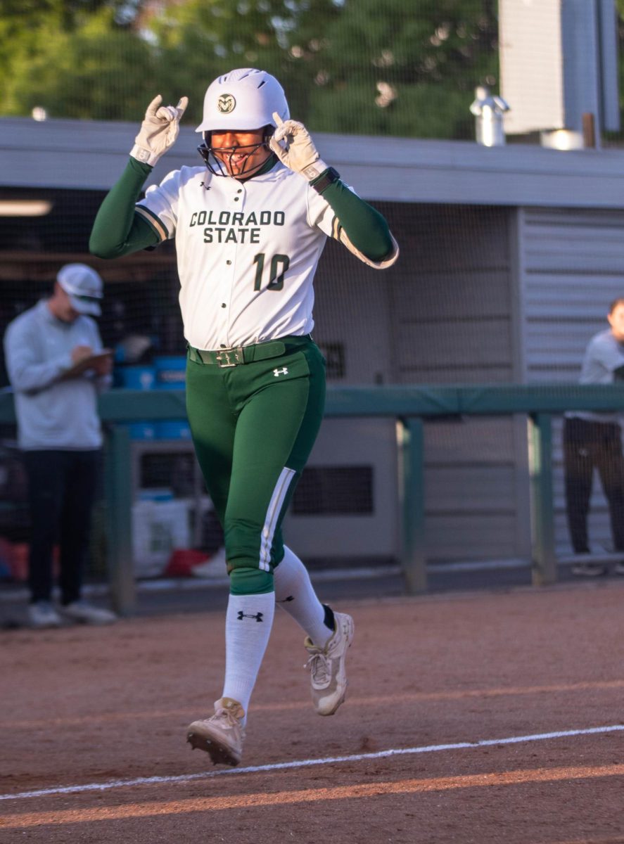 Jailey Wilson runs into home base during homerun against Grand Canyon University on April 30.