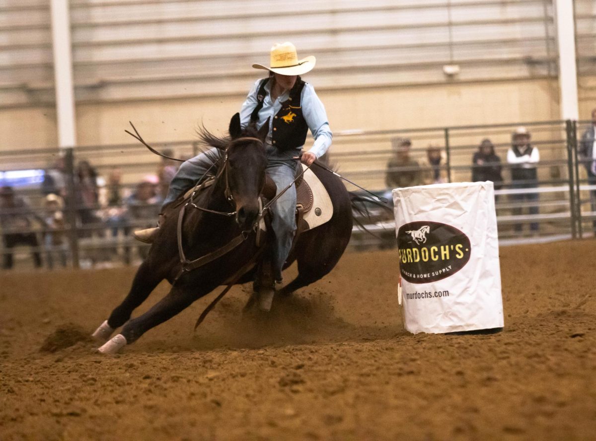 University of Wyoming barrel racer Makenna Baker races around the Murdoch's barrel during Colorado State University's 76th Annual Skyline Stampede Rodeo at The Ranch Events Complex April 3.