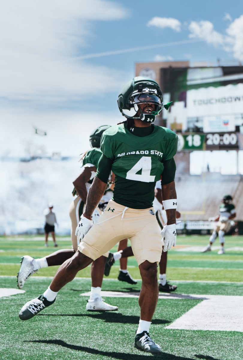 Lavon Brown (4), a wide receiver for Colorado State University, celebrates a touchdown in the Spring Spotlight Football Practice April 11.
