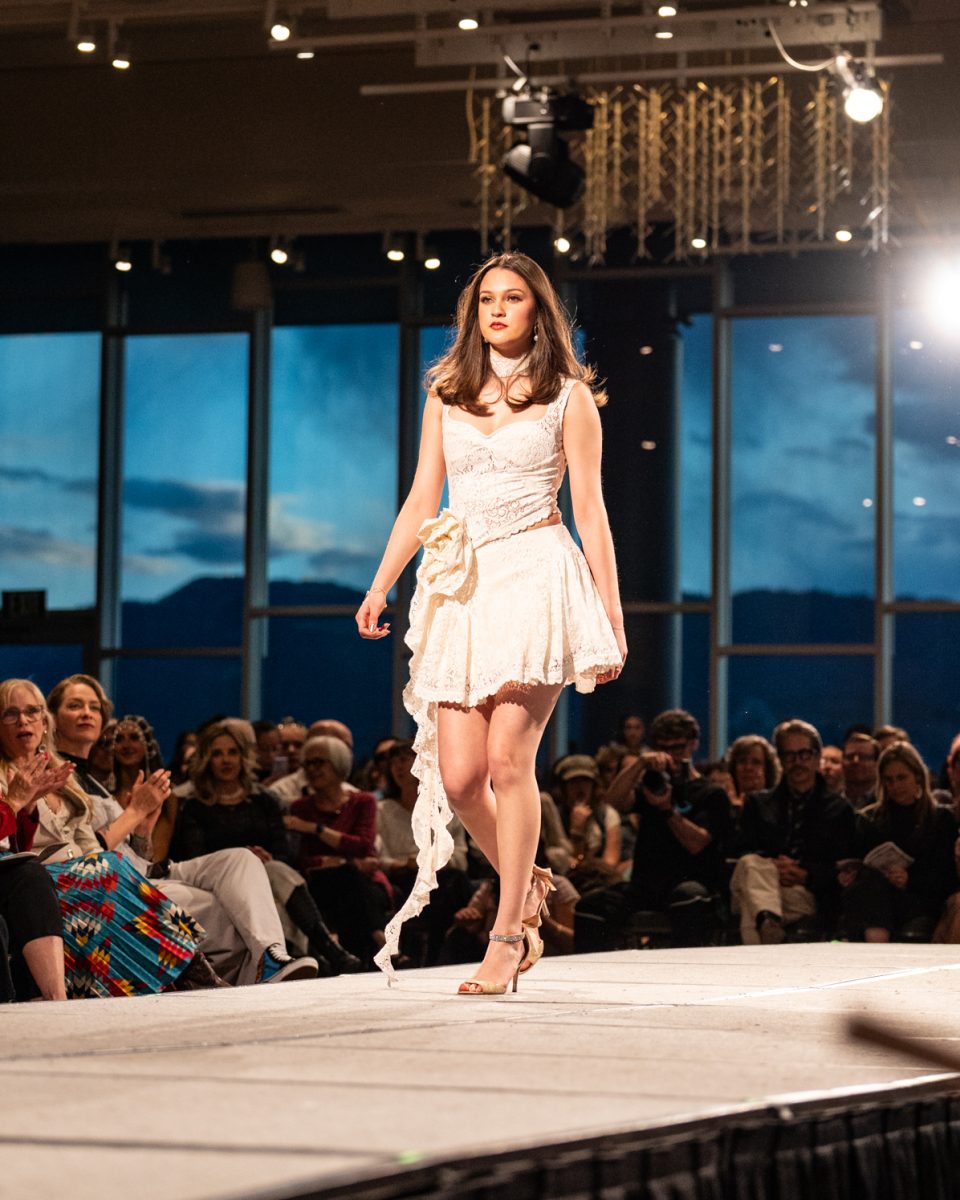 A student model walks the runway during the product development portion of "Fashion Reframed," the Colorado State University design and merchandising department’s annual student-run fashion show in the Lory Student Center Ballroom May 1.