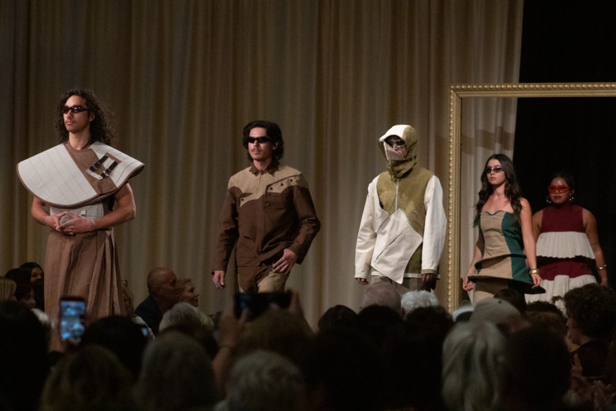 Student models walk the runway during the finale of Ryan Baker’s "The Sculpted Worker" collection during "Fashion Reframed," the Colorado State University design and merchandising department’s annual student-run fashion show in the Lory Student Center ballrooms May 1. This work won Best Collection and was described in the event program as being “inspired by the functional garments depended on every day, designed to protect, support and last.”