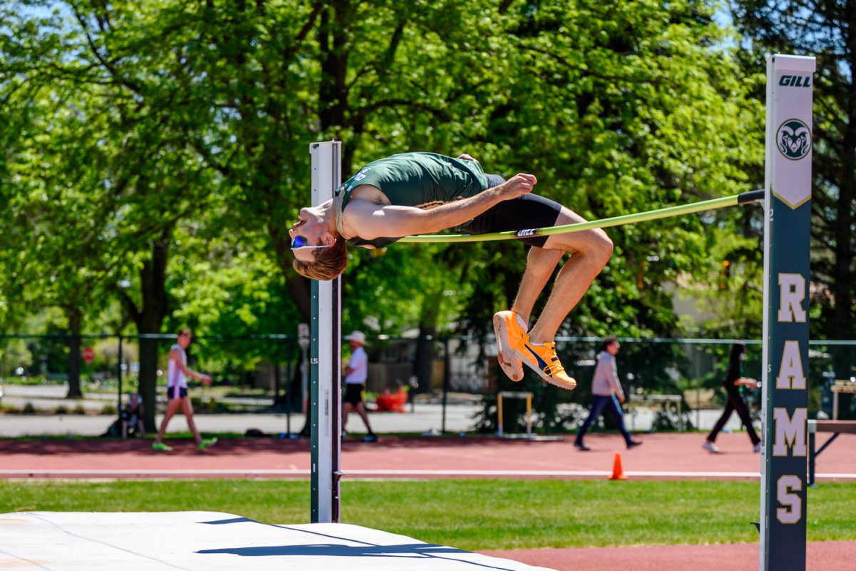 Colorado State University track and field athlete Rhys Travis jumps over the high jump bar during the Doug Max Invitational May 2. Travis placed second with a mark of 2.03 meters.