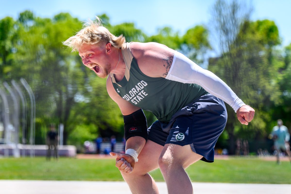 Colorado State University Track and Field athlete Adam Hellbom yells in celebration of a successful discus throw May 2. Hellbom placed second in the Doug Max invitational with a mark of 54.26 meters.