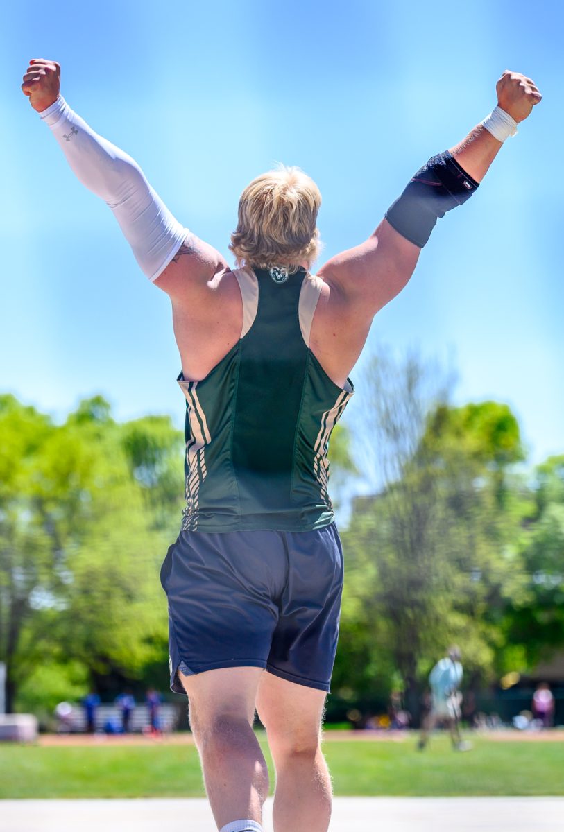 Colorado State University track and field athlete Adam Hellbom cheers after a successful discus throw May 2. Hellbom placed second in the Doug Max invitational with a mark of 54.26 meters.