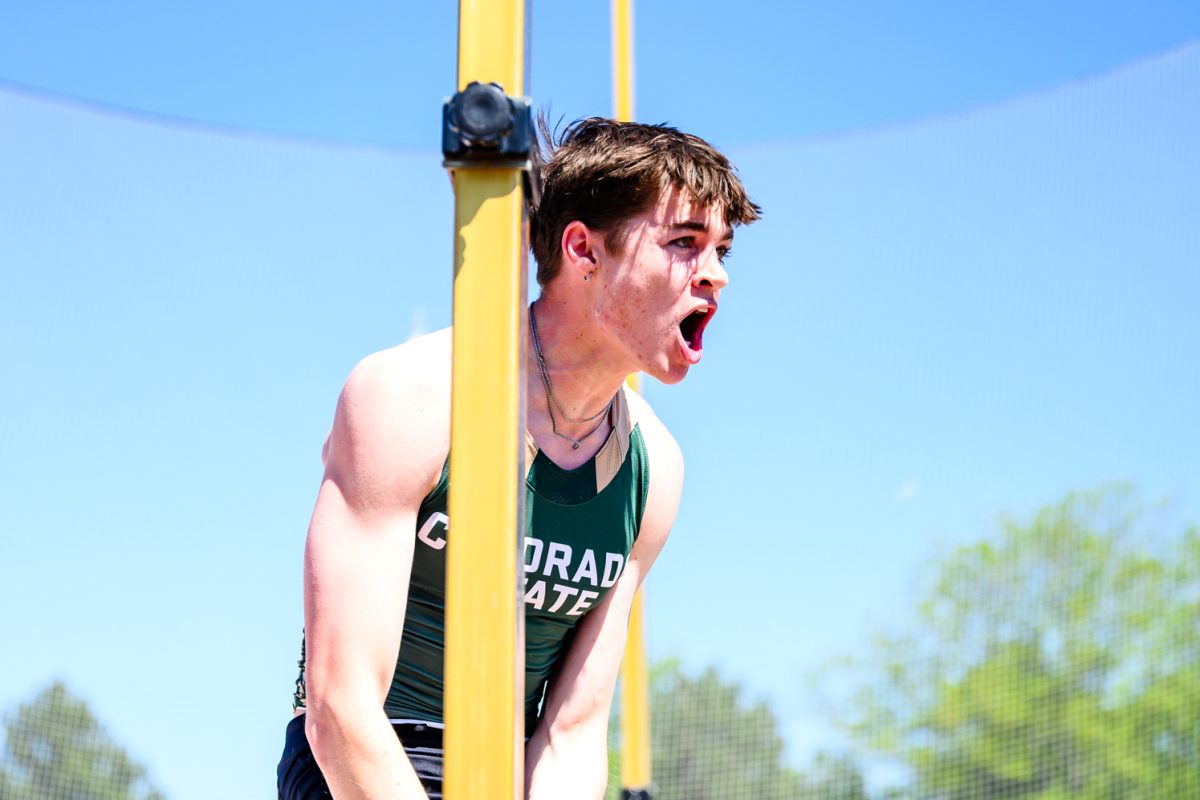 Colorado State University Track and Field athlete Taylor Waters cheers as he walks off the pole vault mat after successfully breaking the program record mark in men's pole vault May 2. Waters placed first in men's pole vault at the Doug Max Invitational with a mark of 5.22 meters.