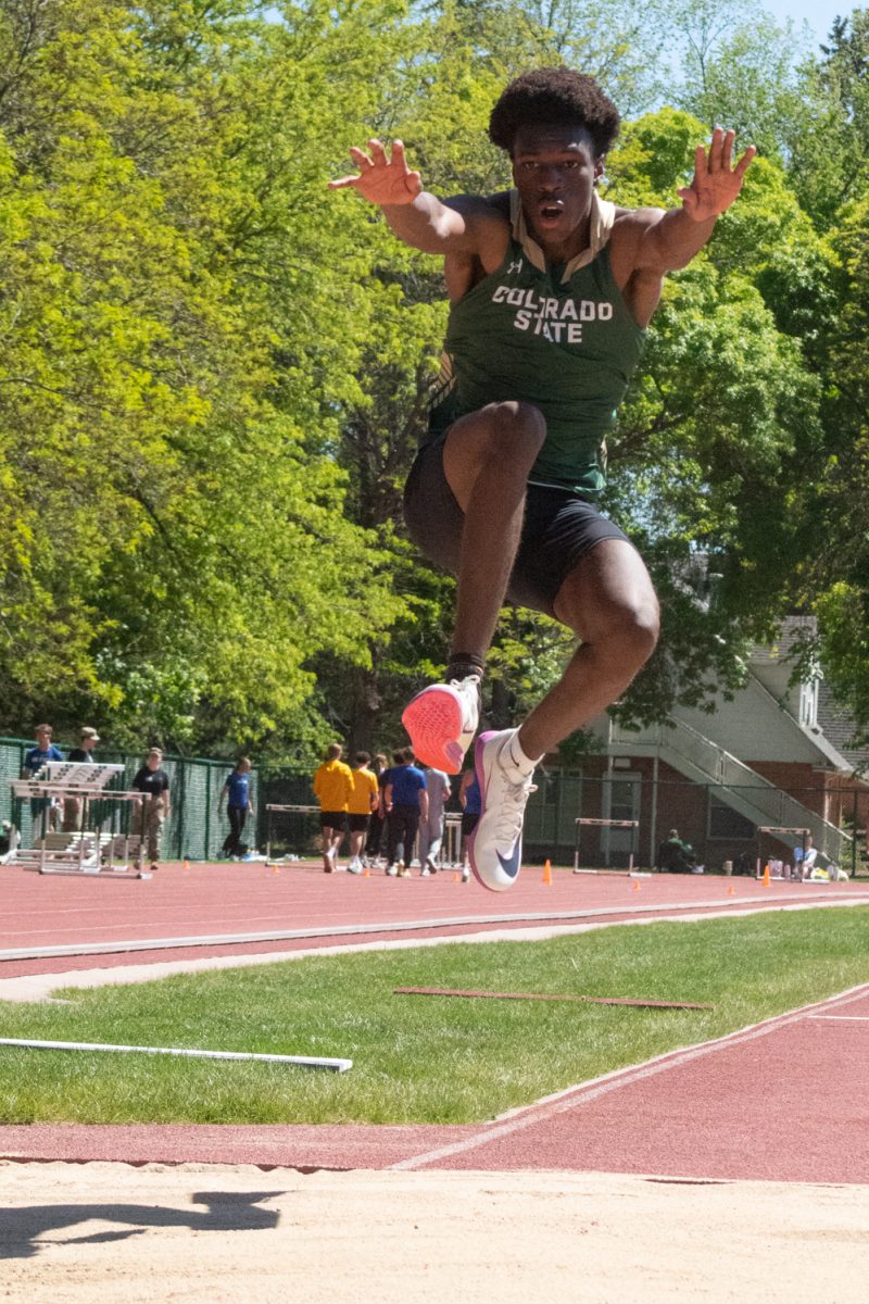 Colorado State University track and field athlete Ndayiragije Shukurani jumps into the sand in the men’s triple jump during CSU’s Doug Max Invitational May 2. Shukurani placed first with a program record-setting jump of 16.13 meters.
