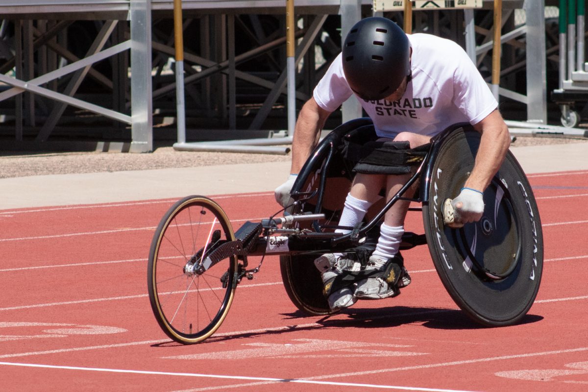 Unattached athlete Tim McCue crosses the line in the 200-meter wheelchair exhibition during CSU’s Doug Max Invitational May 2.