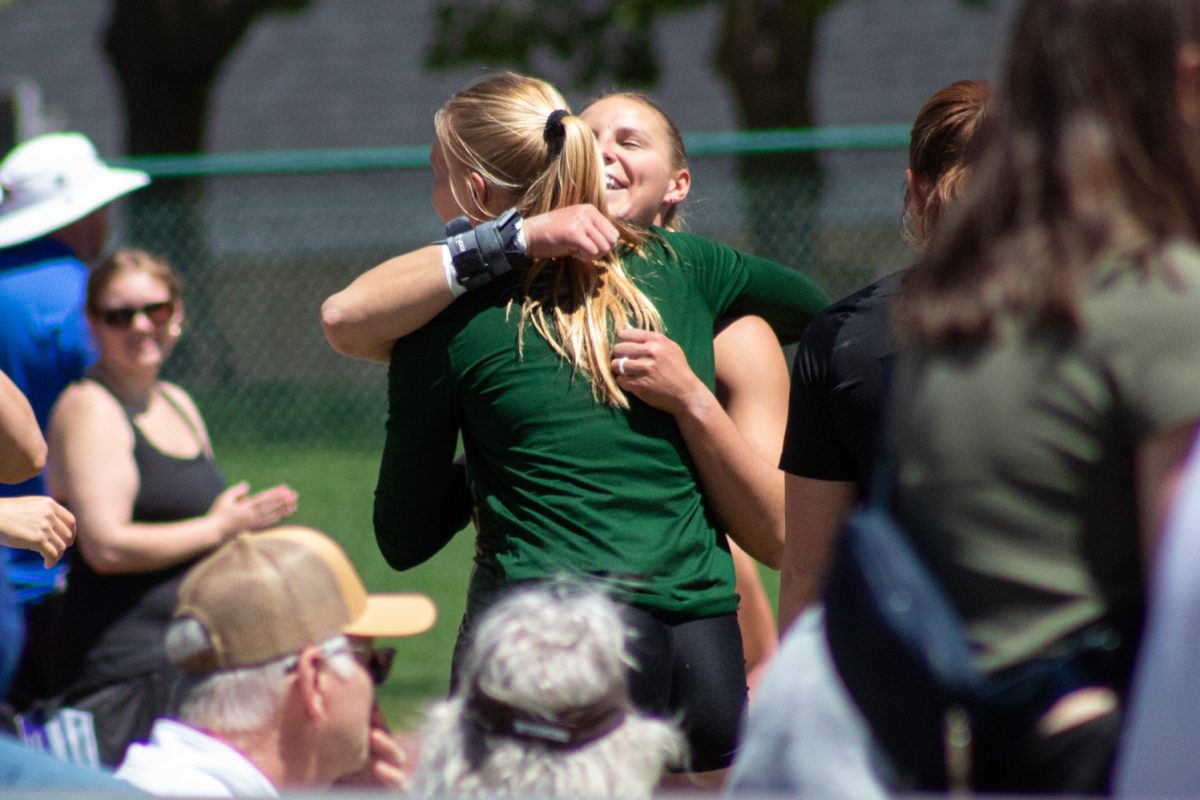 Colorado State University Track and Field athlete Makayla Long celebrates her shot put throw by hugging her teammate during CSU’s Doug Max Invitational May 2.